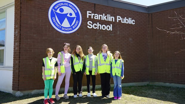 These Kitchener students encourage their classmates to walk to school on Earth Day and every day