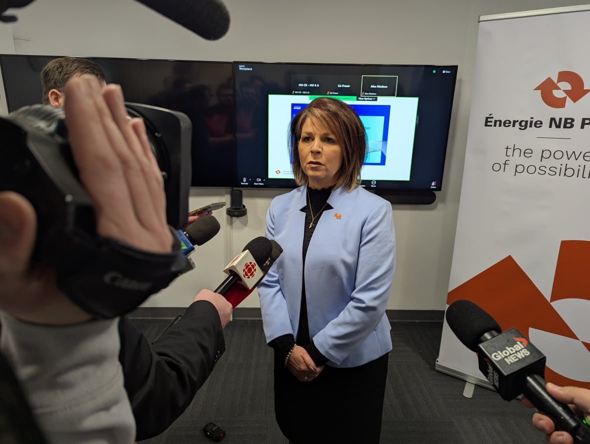 Woman successful  bluish  speaks to reporters