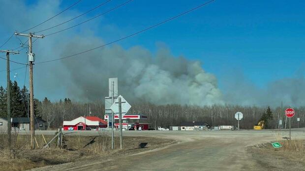 Residents forced out by grass fire in Traverse Bay can return home