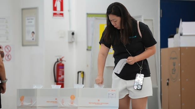 Singapore's governing party extends 66-year rule with another landslide election win