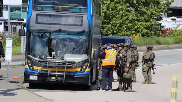 Man with knife taken into custody after barricading himself on bus in Delta: police