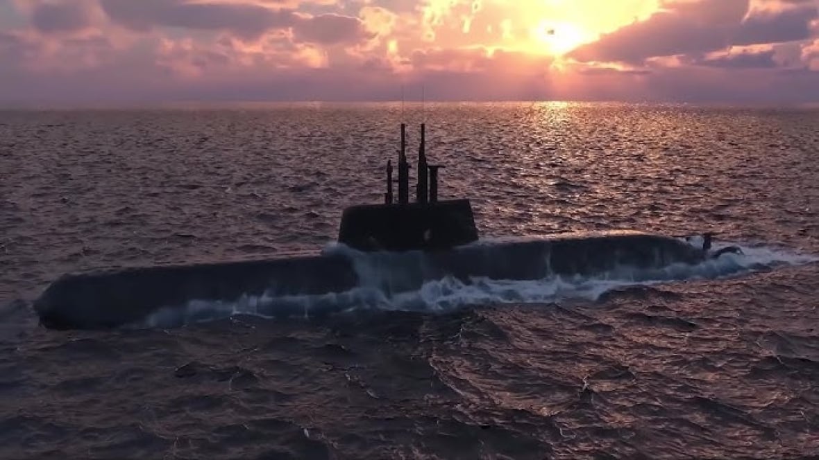 A submarine on the surface of a body of water.