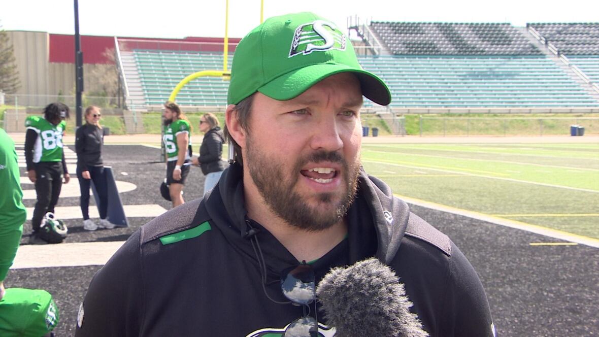 Saskatchewan Roughriders violative  co-ordinator Marc Mueller talking to reporters.