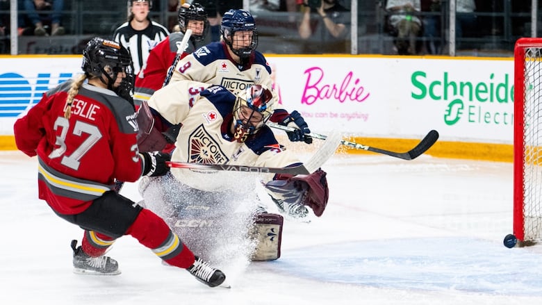 Two female PWHL hockey players.