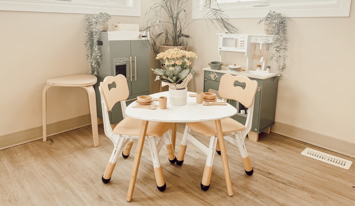 Empty chairs at a child-sized table at Little Ropers Learning, a new child-care facility that was almost ready to open in Nanton, Alta. Operator Cheryl Montgomery has signed a one-year lease on the space and filled it with furniture, toys and play equipment.