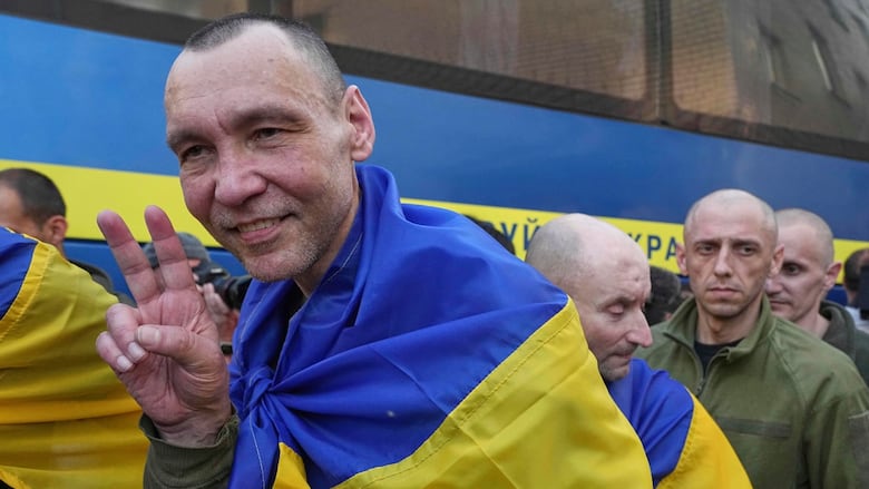 Ukrainian soldiers respond  aft  being freed from Russian captivity during an speech   of POWs successful  Ukraine's Chernyhiv region.