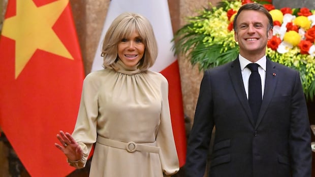 French President Emmanuel Macron downplays shove in the face from his wife