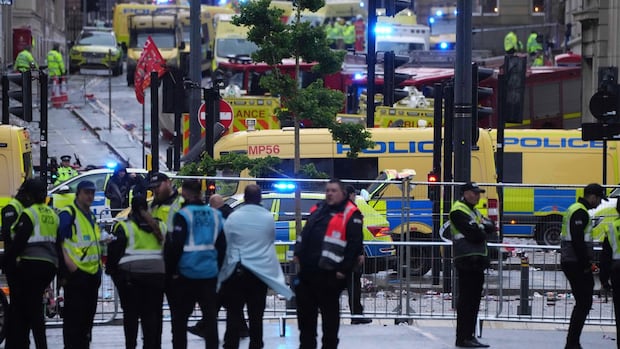 Dozens injured after minivan plows into crowd of celebrating Liverpool soccer fans