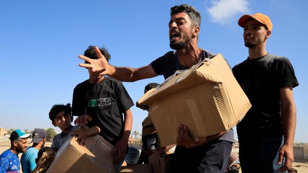 Droves of Palestinians overwhelm new Gaza aid centre in Rafah as warning shots ring out