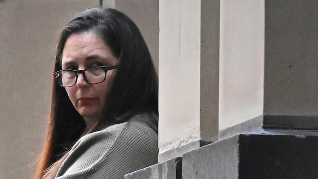 Australian woman accused of killing 3 with toxic mushroom lunch breaks down in court