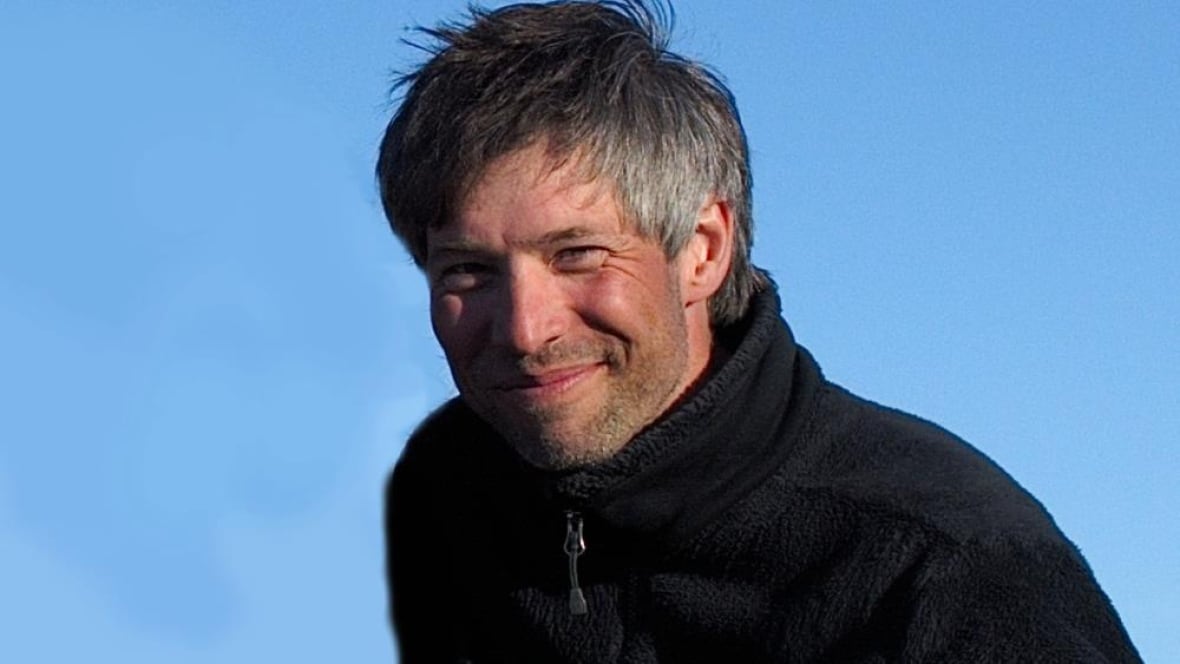 a representation    of a antheral   smiling astatine  the camera