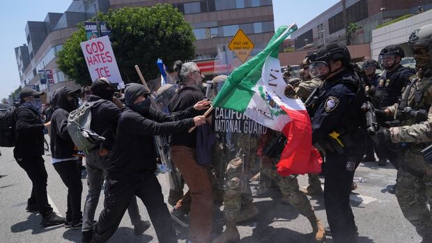 National Guard scuffle with protesters hours after arriving in L.A. on Trump's orders