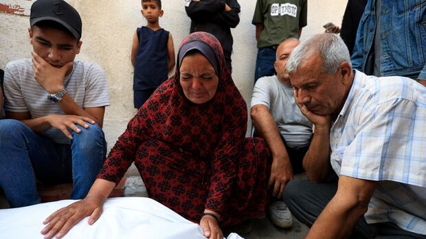 Israeli gunfire kills over a dozen Palestinians near Gaza aid site, health officials say