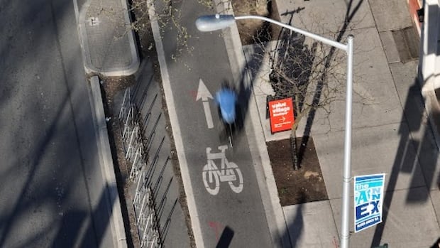 Toronto needs a single set of rules for what vehicles can use bike lanes, says council committee | CBC News
