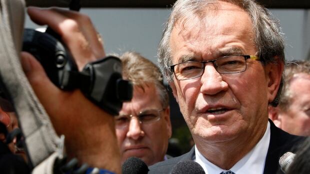 Canadian Auto Workers National President Buzz Hargrove speaks with reporters after meeting with company executives at the DaimlerChrysler Headquarters in Auburn Hills, Michigan May 15, 2007. Hargrove was assured that their will be no further job cuts after the majority purchase by Cerberus Capital Management LP of DaimlerChrysler's struggling Chrysler Group for $7.4 billion.
