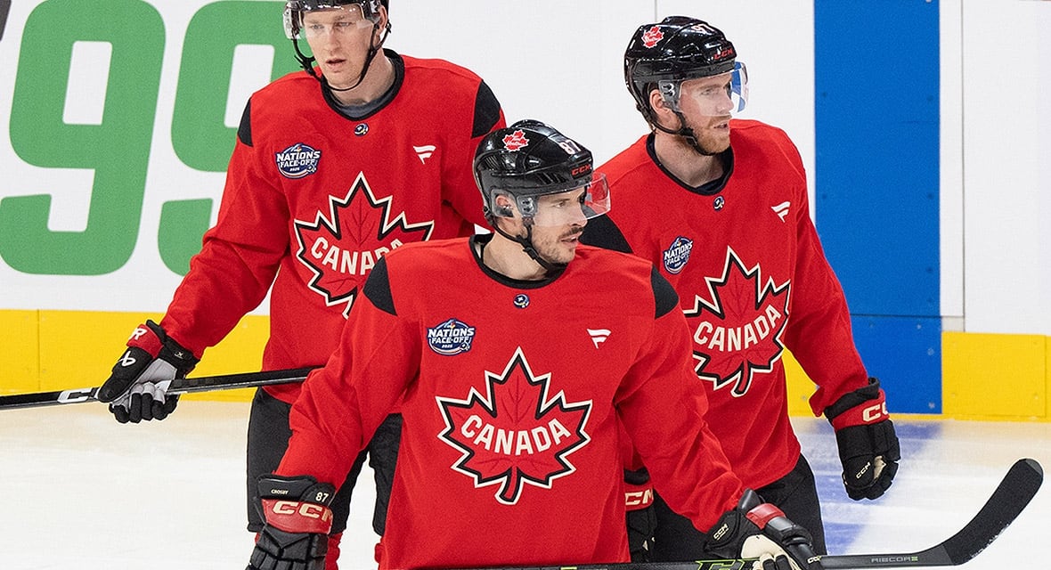 Canadian men’s hockey player Sidney Crosby, Connor McDavid and Nathan MacKinnon watch during a 4 Nations Face-Off hockey practice in Montreal, Quebec on February 11, 2025.