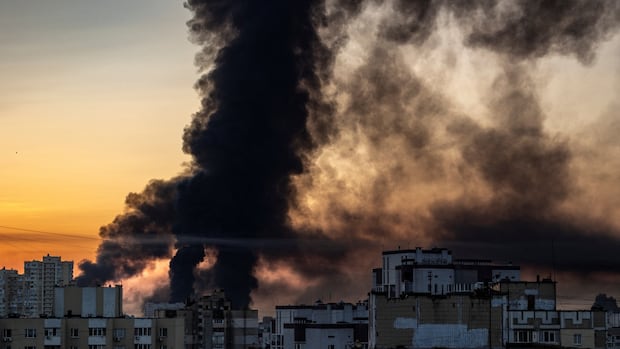 Russian strikes in Kyiv kill at least 16 people, flatten apartment block