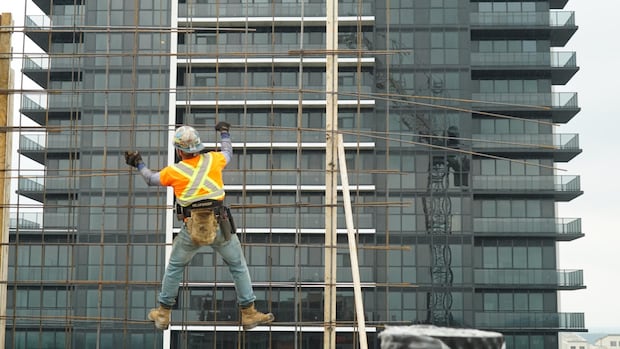 Meet the people working at dizzying heights to lift London out of a housing crisis