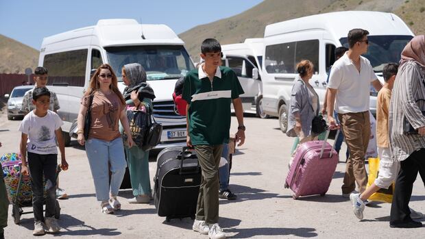 Fragile ceasefire leaves Iranians outside country torn about returning home