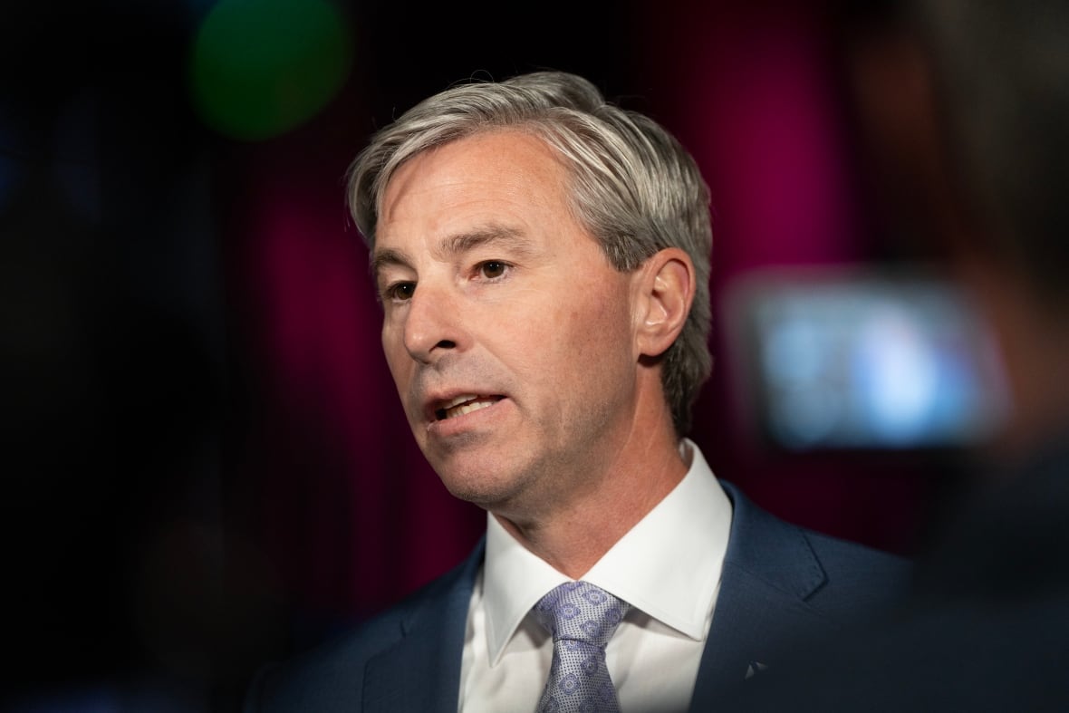 A closeup of Premier Tim Houston
