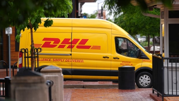 A DHL delivery van is seen in Boulder, Colo., in June 2025.