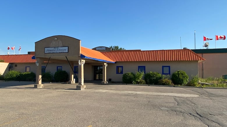 The front exterior of a single-storey motel.