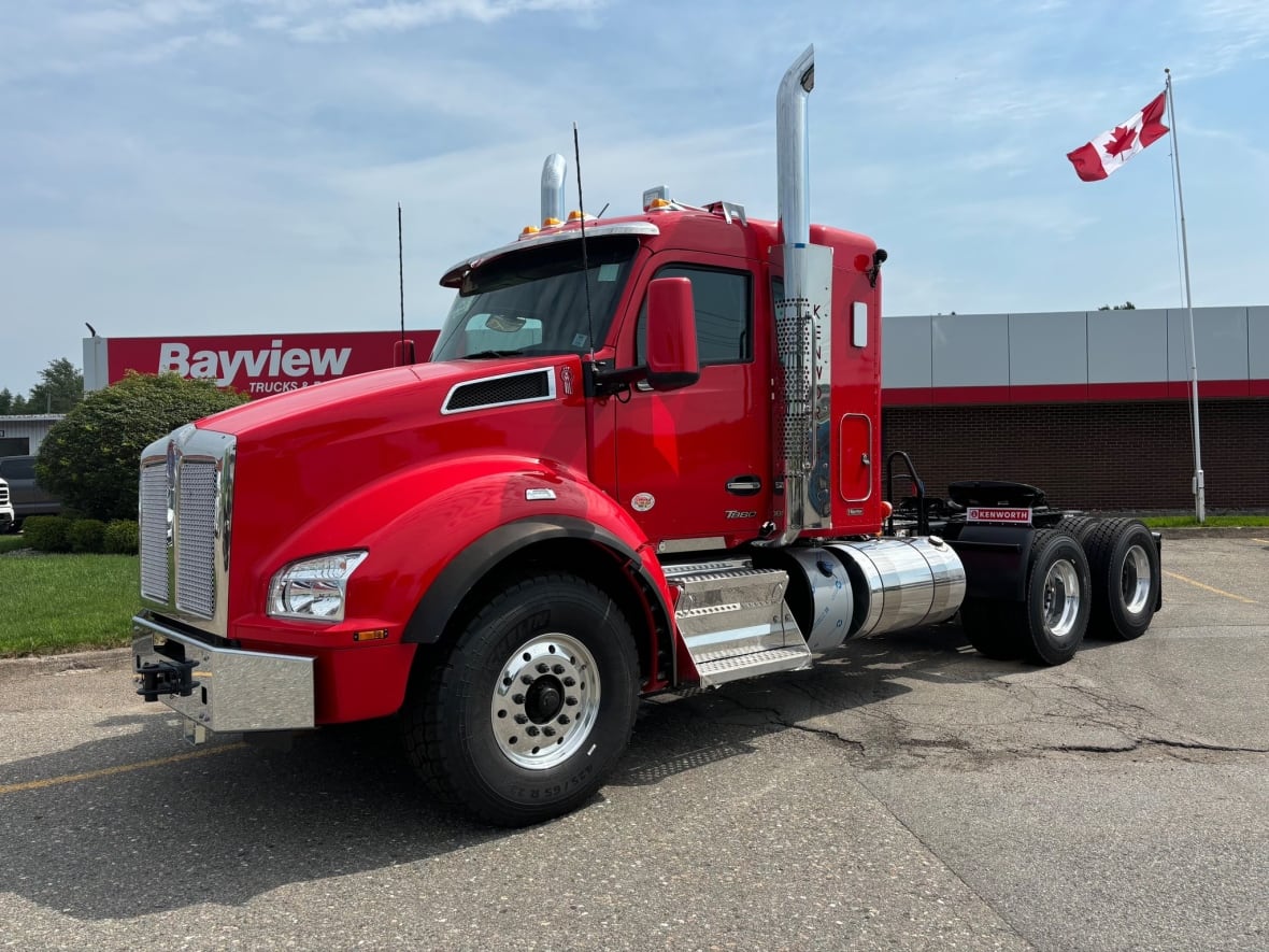 Red transport truck with chrome.