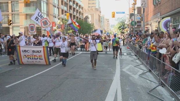 Thousands gather for Pride parade in downtown Toronto | CBC News