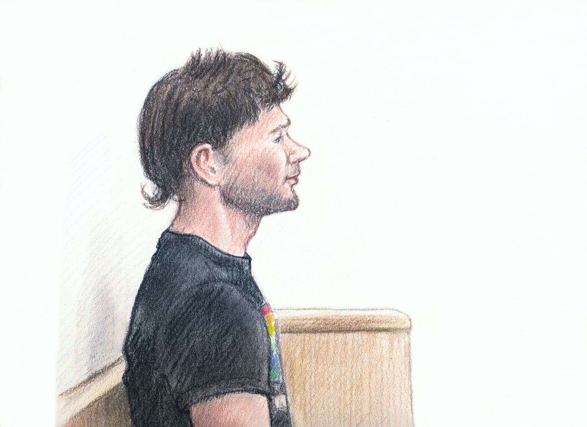 A court sketch of a man in a black graphic t-shirt sitting in court.