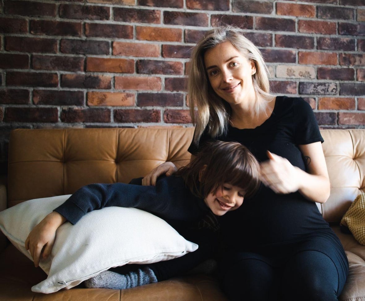 A woman with her child.