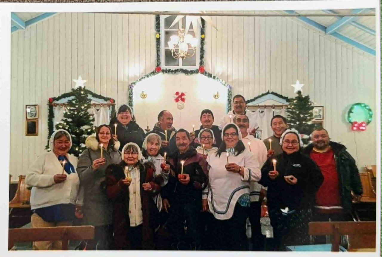 Photo of a group standing in a church setting