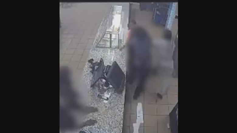 A screenshot from security video.