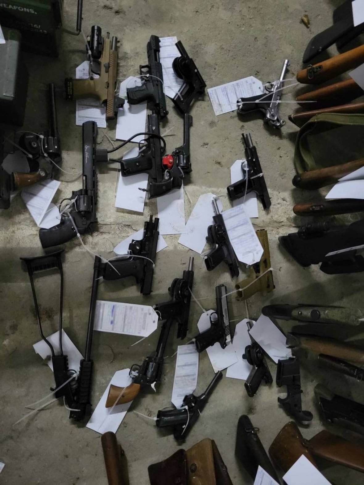 The RCMP said searches conducted in the Québec City area led to the seizure of 16 explosive devices, 83 firearms and accessories, approximately 11,000 rounds of ammunition of various calibres, nearly 130 magazines, four pairs of night vision goggles and military equipment. 