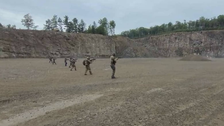 In this provided photo, the RCMP says this is the "military-style training in which the accused took part."