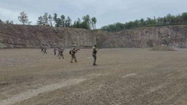 In this provided photo, the RCMP says this is the "military-style training in which the accused took part."