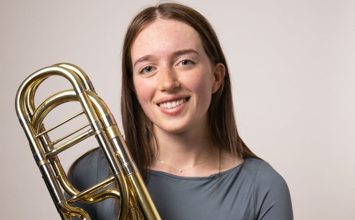 Malena Lorenson poses with her bass trombone.