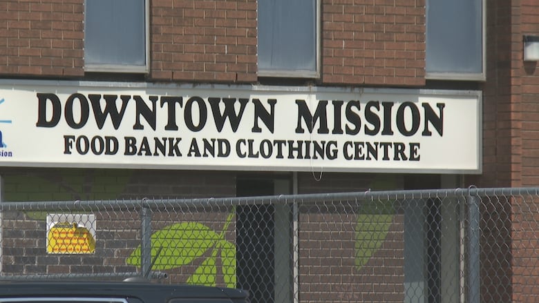 A sign at a homeless shelter.