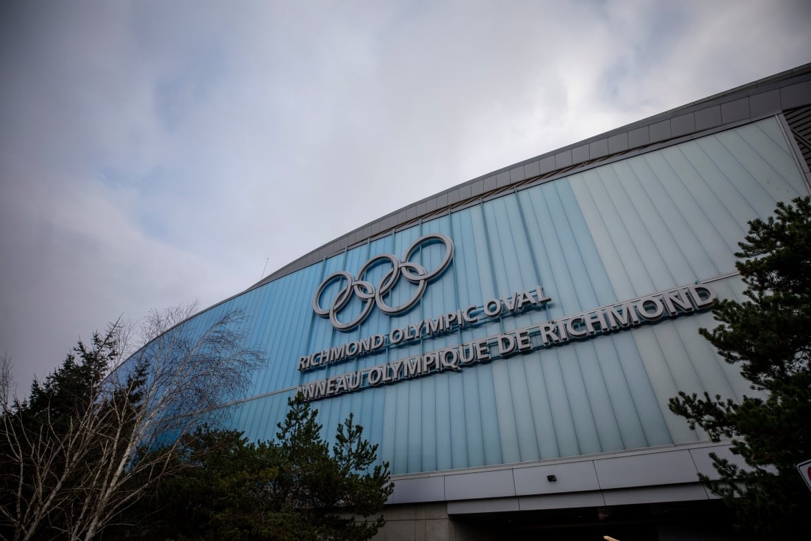 A photo of the outside of Richmond Olympic Oval showing Olympic rings.