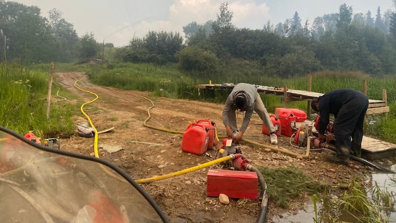 People use pumps to get water.
