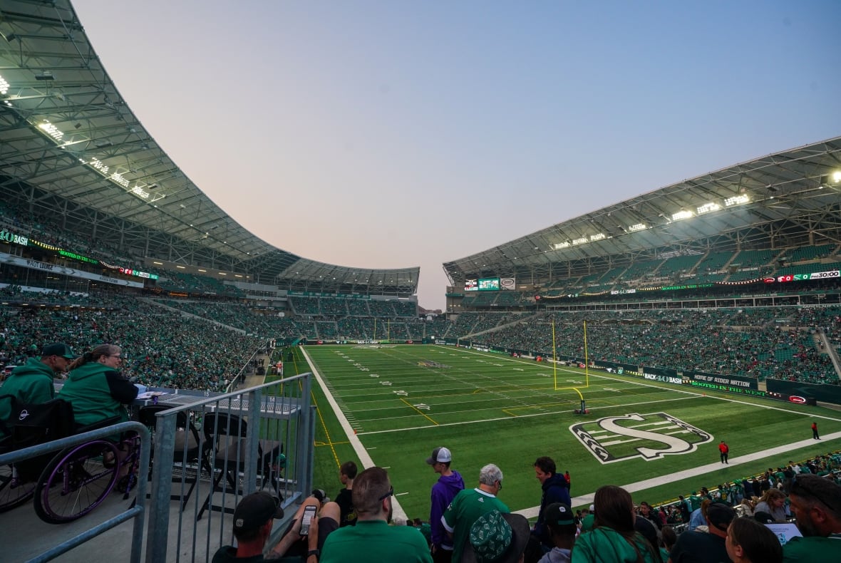 A football field is shown before kickoff.
