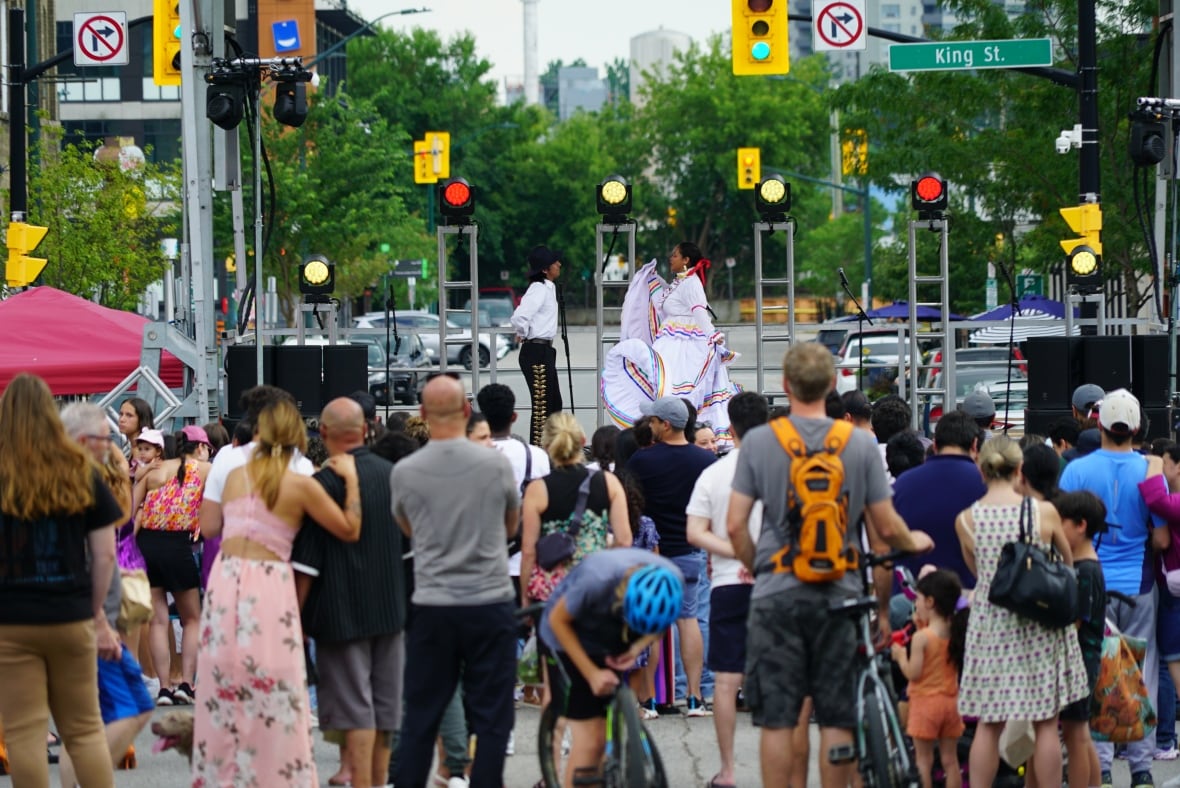 Crowds filled the intersection of King and Talbot Streets in downtown London watching various performances during the city's annual multicultural festival. 