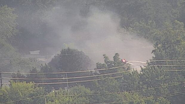 Firefighters responding to fire on Campbell Avenue near College Avenue
