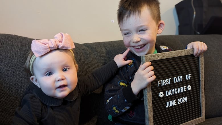 A photo of a two-year-old girl and six-year-old boy