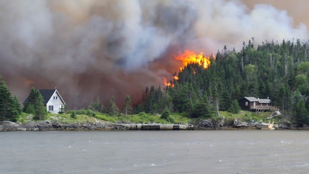 Communities surrounding out of control wildfire near Chance Harbour told to be ready to flee