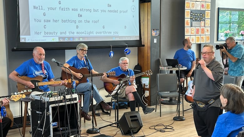 Singers and musicians from L'Arche's Monday Morning Music Club celebrated 25 years of making music in London on July 14, 2025.