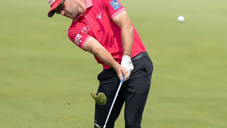 Canadian golfer Corey Conners hits his approach shot on the eighth hole in the second round of the Canadian Open in Caledon, Ont., on June 6, 2025.