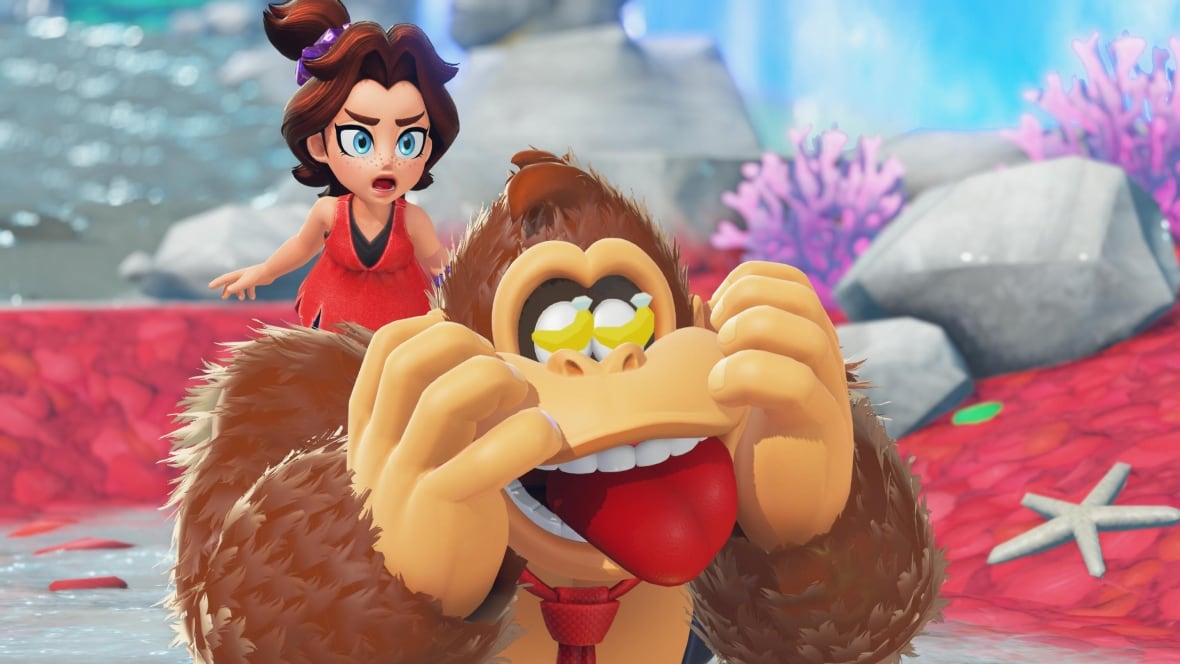 video game screenshot of a little girl on donkey kong's (a big gorilla) back.