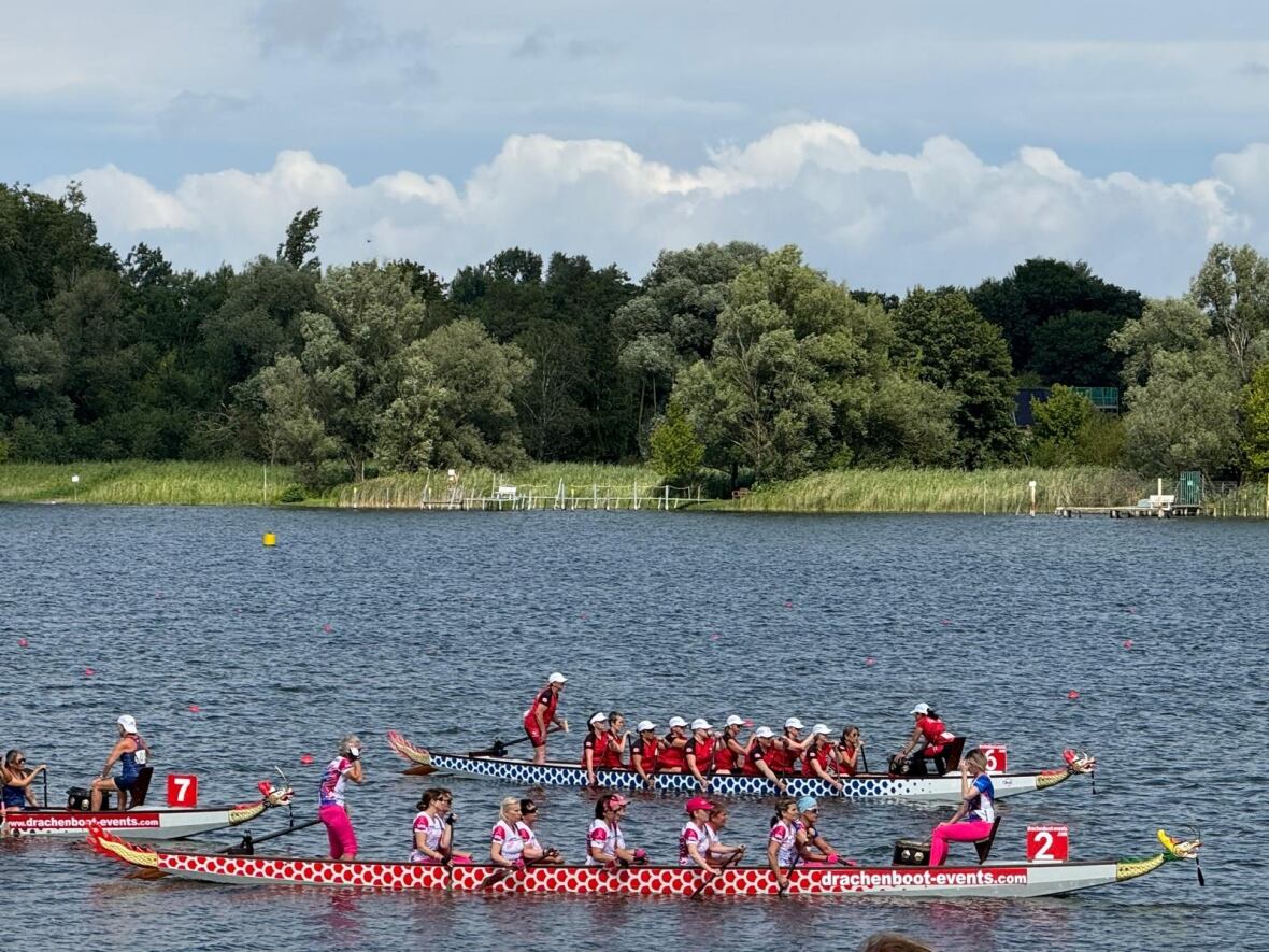 The Canadian BCP small boat crew (far) on the water winning the 2000 metre race. 