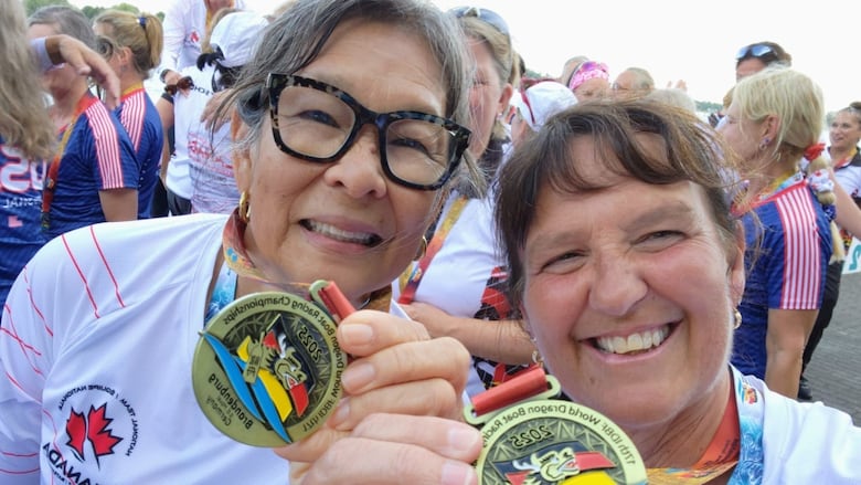 Gail-Lynn Gastaldi and Linda Kuska, both from London, show off their gold medals.