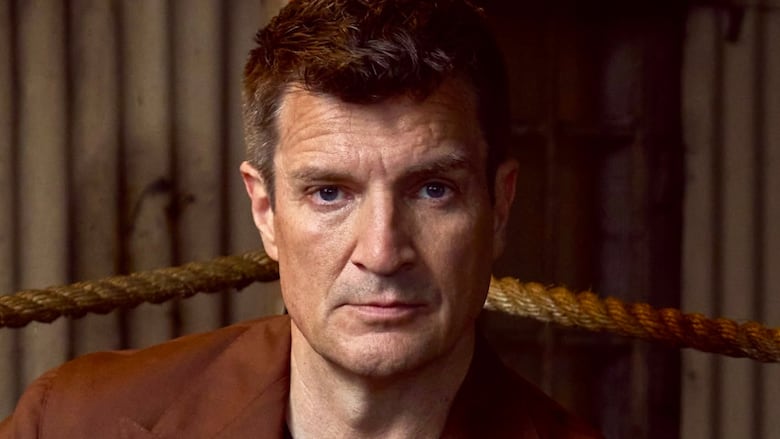 Headshot of Nathan Fillion.